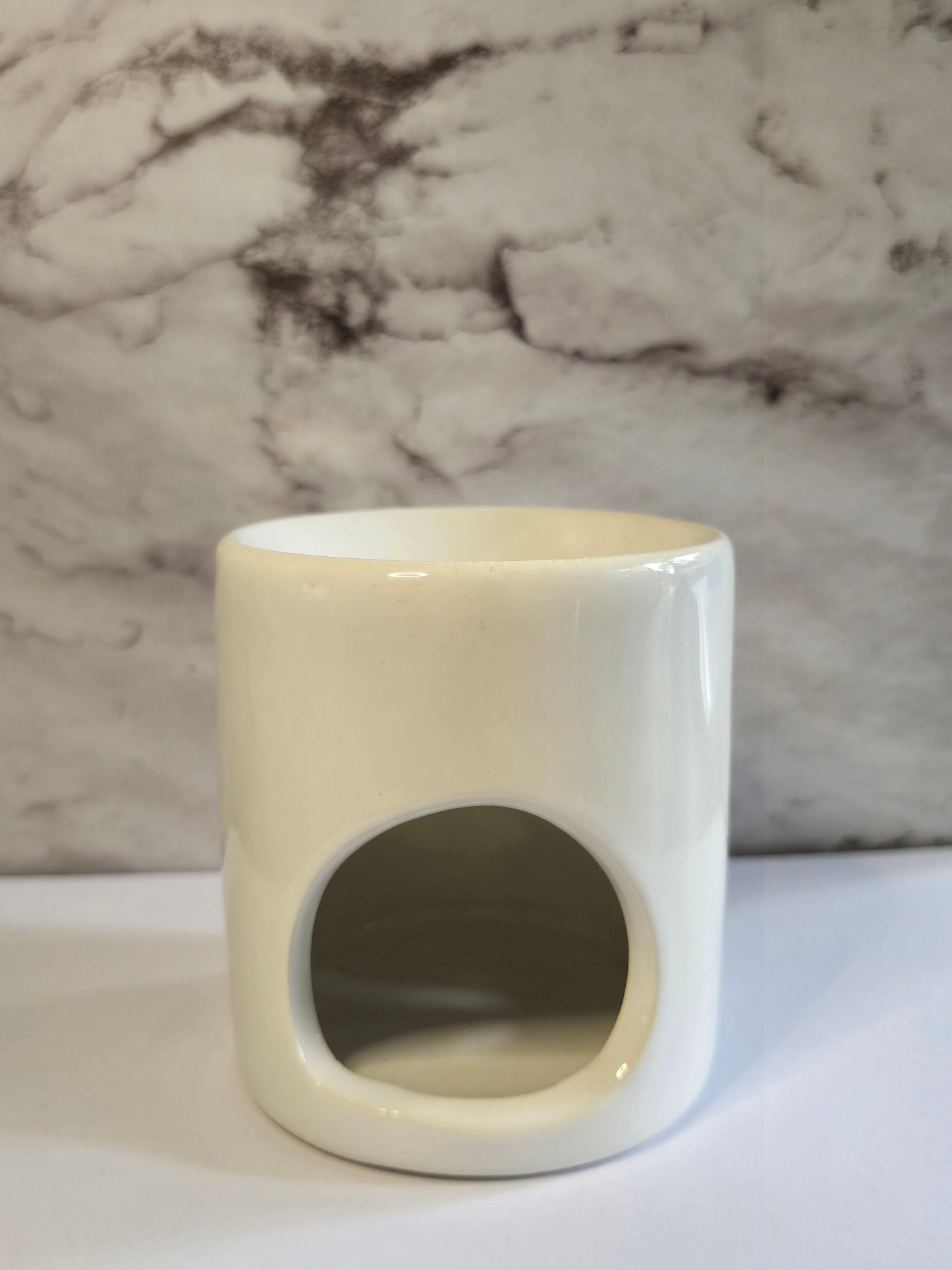 Witte wax brander met gouden hartje