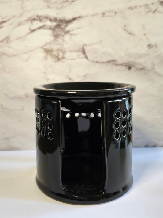 Zwarte waxbrander met gaten