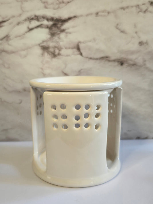Witte waxbrander met gaten